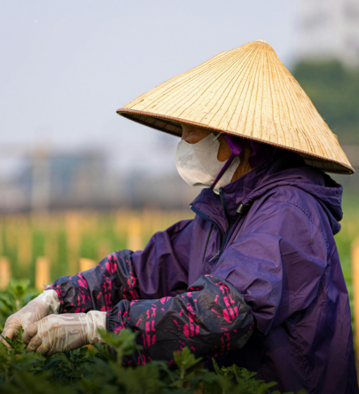 Smiling Farmer with Milk Bottle